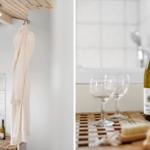 Badezimmer mit Bademantel und Whiskyflasche auf Holztablett