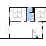 Two bedrooms, kitchen, and bathroom are shown in the floor plan.