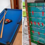Billardtisch mit Stöcken und Kugeln. Tischfußball mit roten und blauen Figuren.