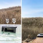 Hochwertiger Whirlpool mit Champagner und Gläsern auf einer Terrasse mit Blick auf trockenes Gras.