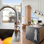 Küche mit modernem Wasserhahn und Kücheninsel mit Marmor und Holz.