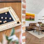 Holzspielplatte mit Würfeln und Wohnzimmer mit Sofa und Wandbild.