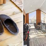 Fell-Slippers auf Holzdecke. Terrasse mit Grill und Sitzgruppe vor großem Fenster.