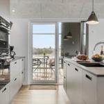 Modern kitchen with view of terrace and garden