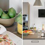 Kitchen area with fruit, wine, and cookbook. Modern setup with light surfaces.