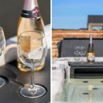 Ein Champagner mit zwei Gläsern auf einer Whirlpool-Platte im Freien.
