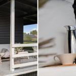 Terrasse mit Liege und Blick auf Garten. Tisch mit Kanne, Tasse und Blumen.