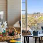 Tisch mit Spiel und Blumen vor Fenster mit Blick auf Landschaft