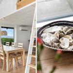 Dining room with table, chairs, and water view. Basket with shells by window.