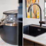Küche mit Airfryer und modernem Wasserhahn im Edelstahl-Design.
