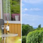 Terrasse mit Tisch, zwei Gläsern und einer Weinflasche. Blick auf grüne Bäume und blauen Himmel.