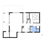 Wohnung mit Küche, Bad, Schlafzimmer und Treppenhaus zur oberen Etage.