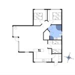 Dieses Apartment hat zwei Schlafzimmer, eine Küche und ein Bad.