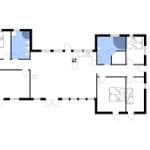 Grundriss einer Wohnung mit drei Schlafzimmern, Küche und Bad.