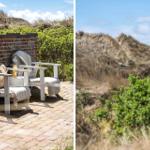 Terrace with two white chairs and view of dunes.