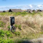 Outdoor charging station with view of traditional houses