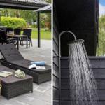 Outdoor area with loungers and grill. Outdoor shower against black wall.