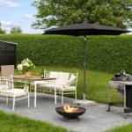 Terrace with table, chairs, umbrella, grill, and fire pit.