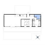 Apartment with kitchen, bedrooms, and bathroom. Hallway with stairs to upper level.
