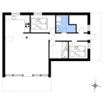 Apartment with kitchen, bathroom, and two bedrooms with beds.