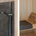 Shower with shower head and sauna with wooden bench and towel
