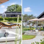 Outdoor area with hot tub, sun loungers, and terrace in front of modern wooden house.