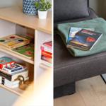 Bücherregal mit Spielen und eine graue Couch mit Decke und Reiseführer.