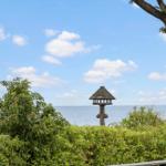 Hütte mit Blick auf Meer und Himmel