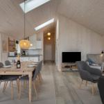 Wohn- und Essbereich mit Holzwand, Tisch, Stühlen und TV.