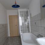 Bathroom with bathtub and shower