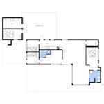 Funktionaler Grundriss mit Küche, Schlafzimmer und überdachter Terrasse.