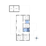 Dieses Haus hat drei Schlafzimmer, eine Küche, ein Bad und eine Garage.