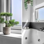 Badezimmer mit Badewanne, Fenster und Pflanzen