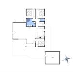 Dieses Haus hat drei Schlafzimmer, eine Küche und eine Garage.
