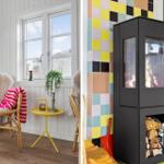 Room with seating, window, and tiled wall with wood-burning stove.