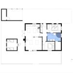 This floor plan shows an apartment with a kitchen, two bedrooms, and a bathroom.