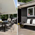 Terrasse mit Tisch und Stühlen. Bank mit Kissen an Hauswand.