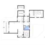 Plan zeigt Wohnfläche mit Schlafzimmer, Küche und überdachter Terrasse.