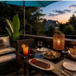 Terrasse mit Esstisch, Sitzgelegenheit und Blick auf Wohnhaus