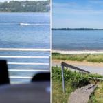 Blick auf ruhiges Wasser mit Boot und Strand. Steigungsstufen führen zum Ufer.
