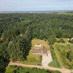 Haus mit Dach im Wald, Spielplatz und Blick auf die Nordsee.