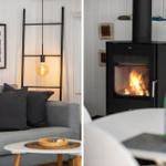 Ein grauer Sofa mit Kissen, eine Hängelampe und ein Kamin mit brennendem Feuer.