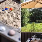Spielplatz mit Sand und bunten Kinderspielzeugen. Terrasse mit Sonnenschutz und Blick auf grüne Wiesen.