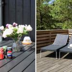 Terrasse mit Tisch, Blumen und Getränken. Liegestühle mit Streifenhandtüchern und Blick in den Wald.