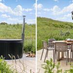 Außenbereich mit Whirlpool und Terrasse mit Tisch und Stühlen.