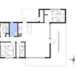 Wohnung mit drei Schlafzimmern, Küche und überdachter Terrasse.