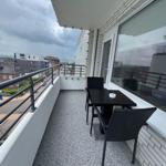 Balcony with Table and Chairs