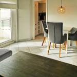 Bright Living Room with Dining Area and Sofa