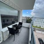 Balcony with table and chairs