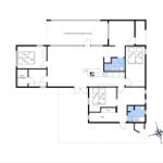 Funktionaler Grundriss mit drei Schlafzimmern, Küche und überdachter Terrasse.
